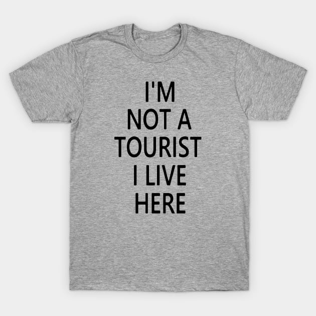 I'M NOT A TOURIST I LIVE HERE T-Shirt by thedeuce